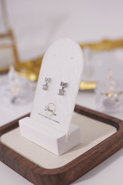 E048-White crystal bow earrings